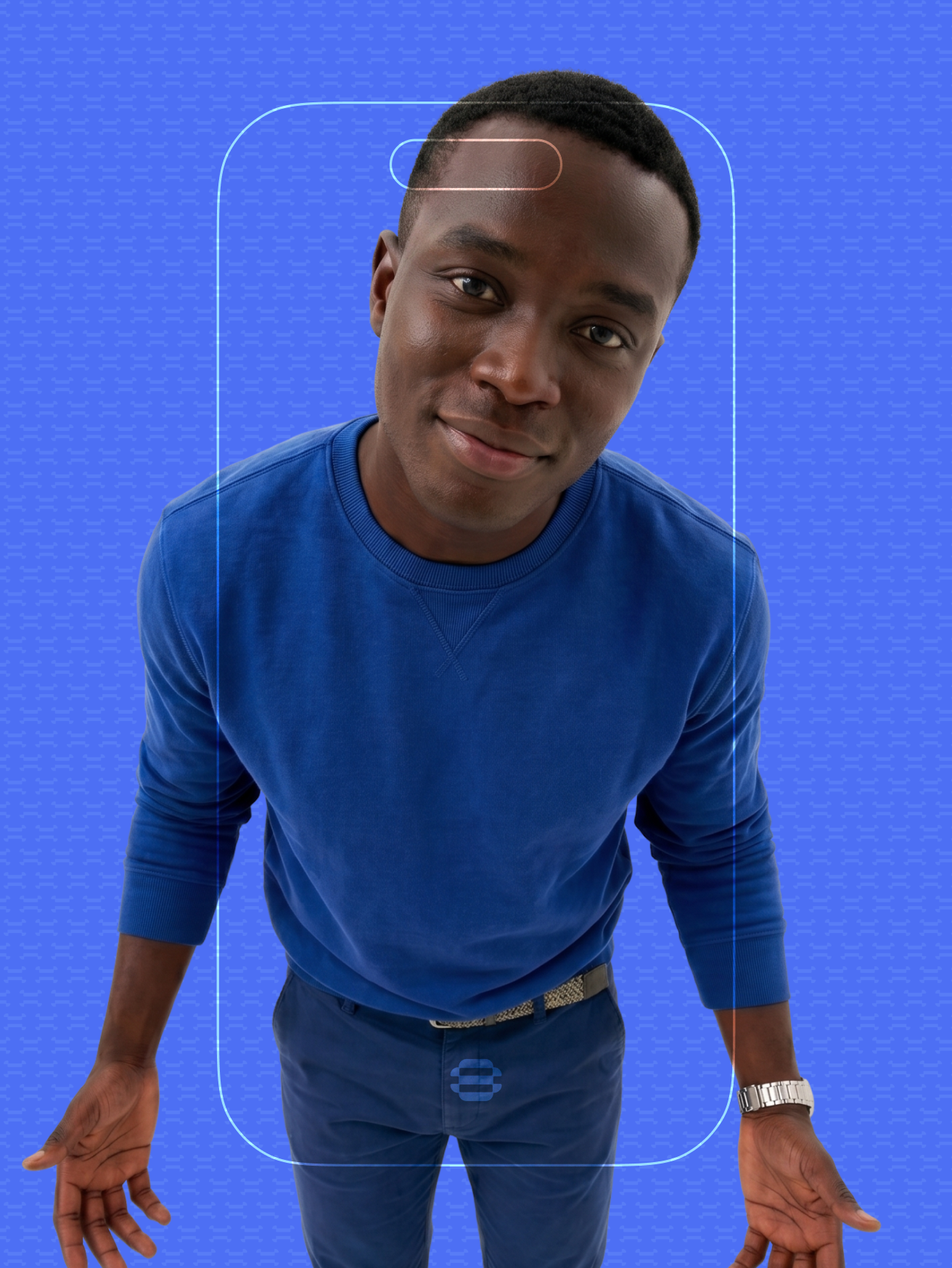 Freelancer in a blue sweatshirt smiling at the camera