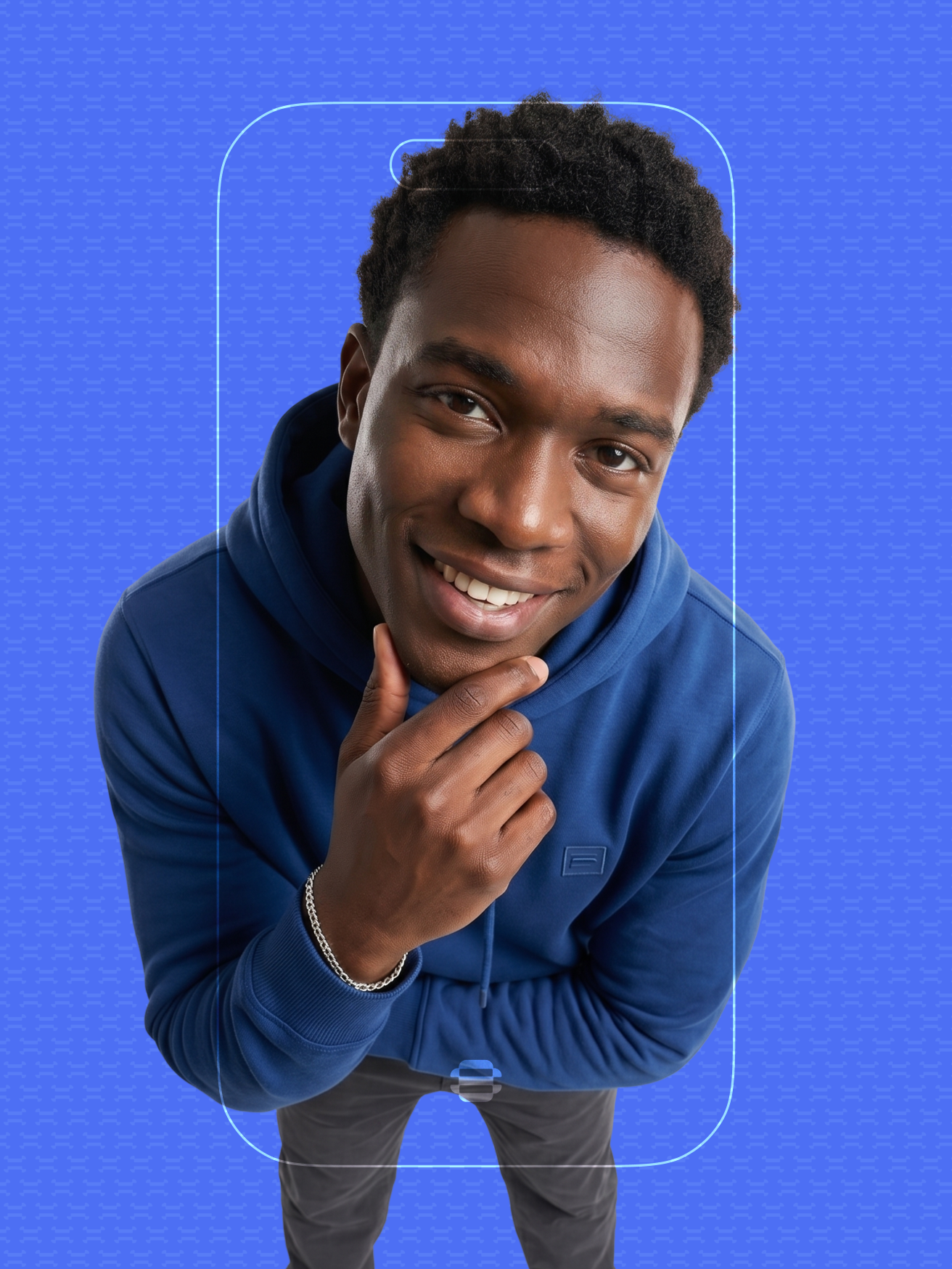 Freelancer in a blue hoodie smiling at the camera